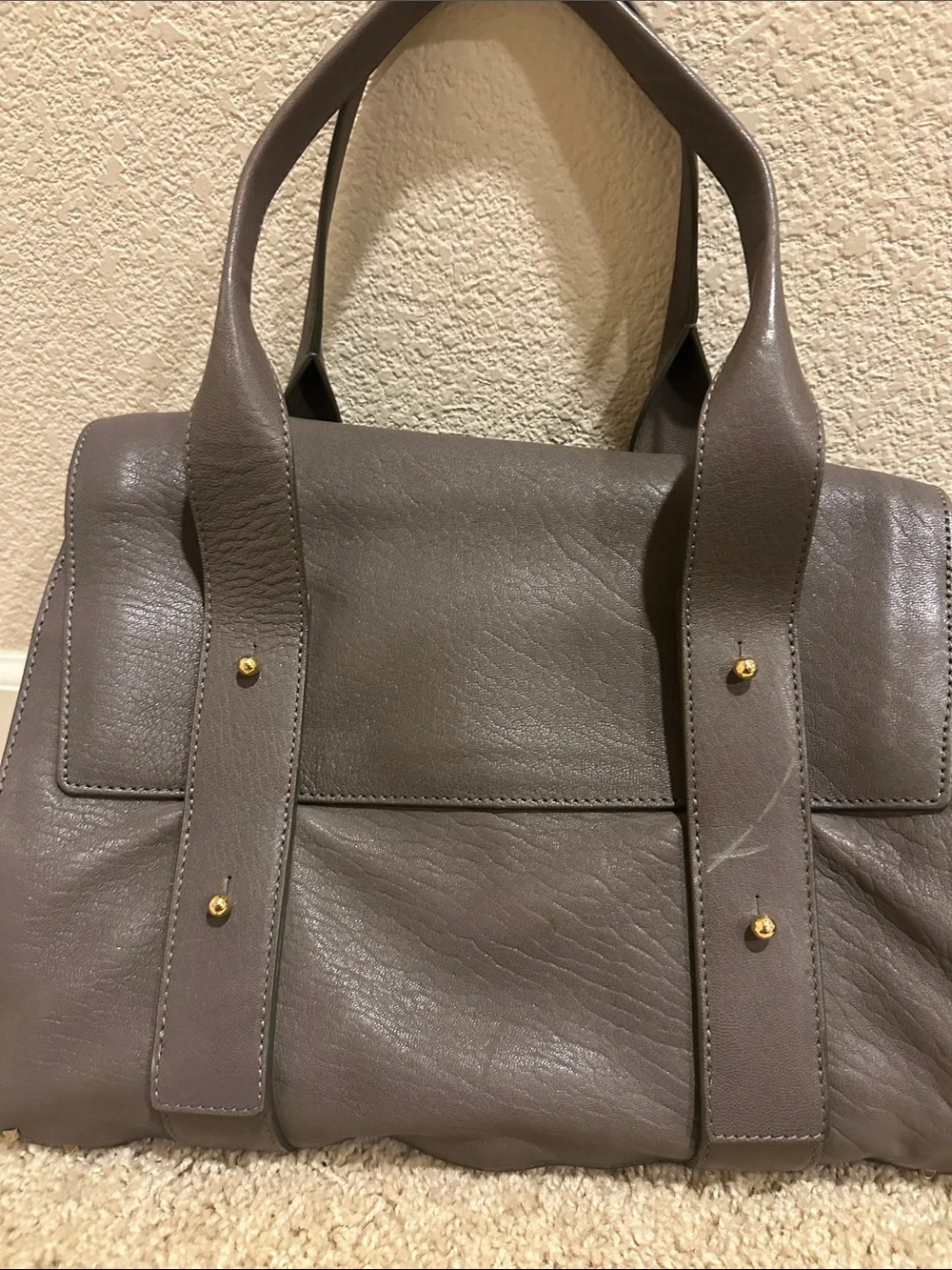 Marc Jacobs Taupe Stanton Leather Top-Handle Satchel with Gold Hardware.